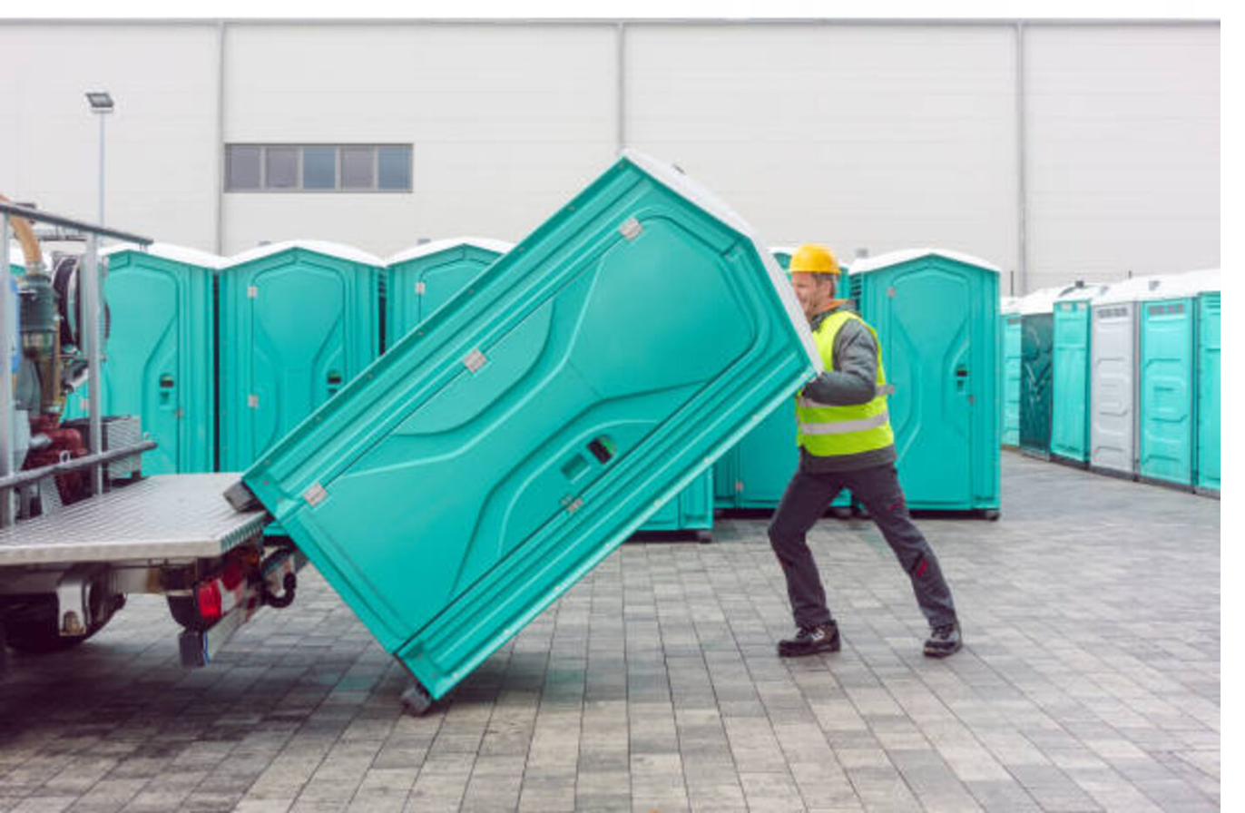 Service truck responding to an on-site portable toilet issue